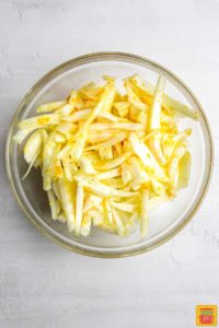 Sliced fennel in a glass bowl