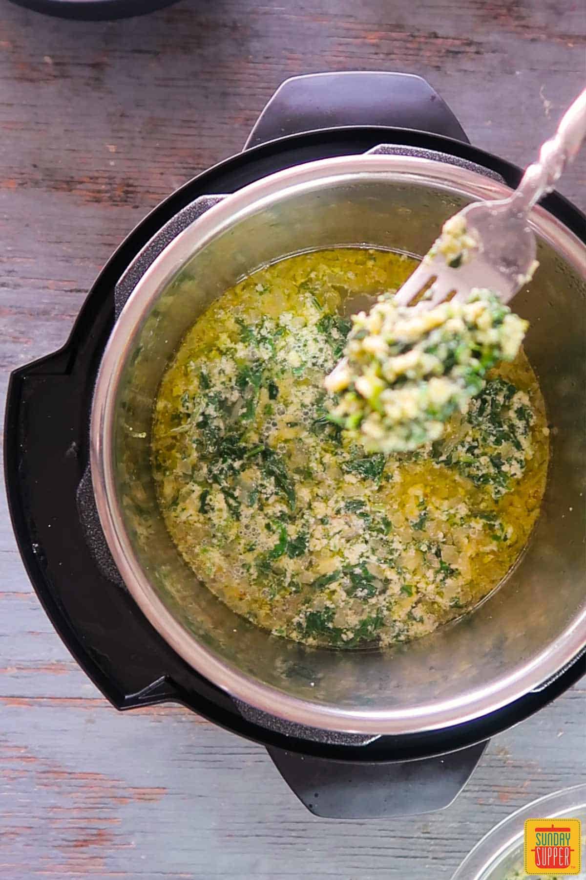 Dropping egg mixture into Instant pot Italian wedding soup