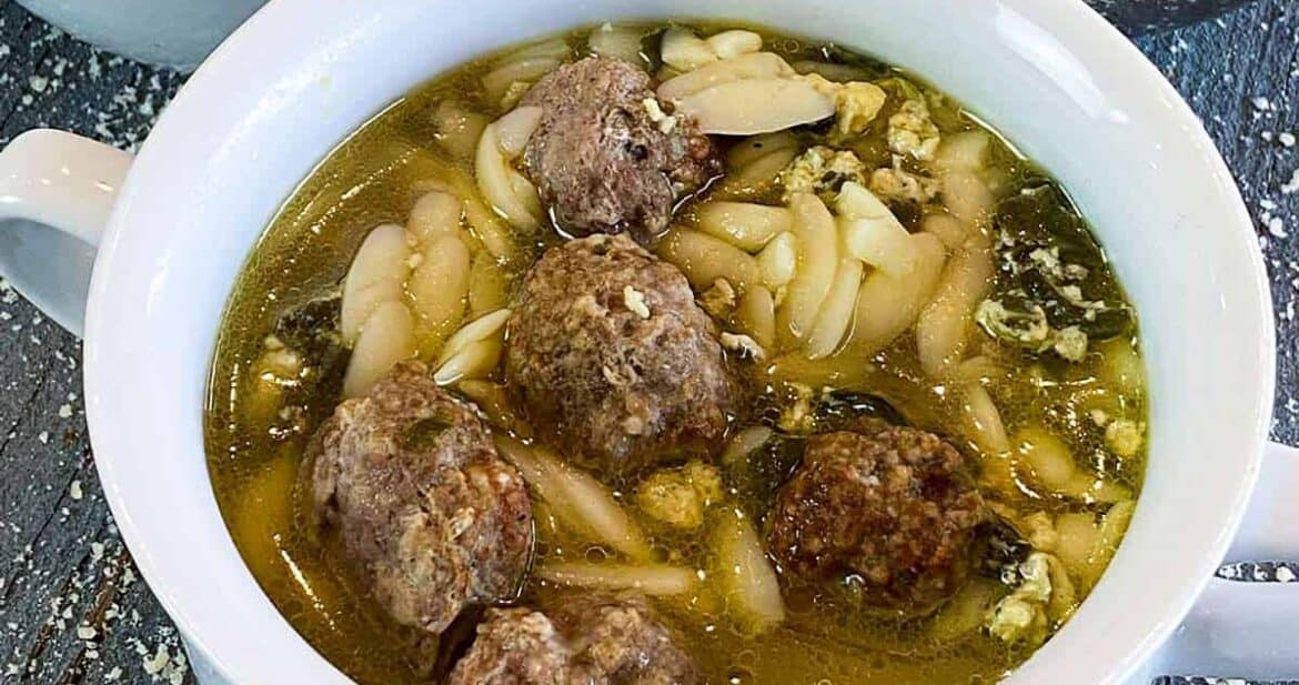 Italian wedding soup in two white bowls