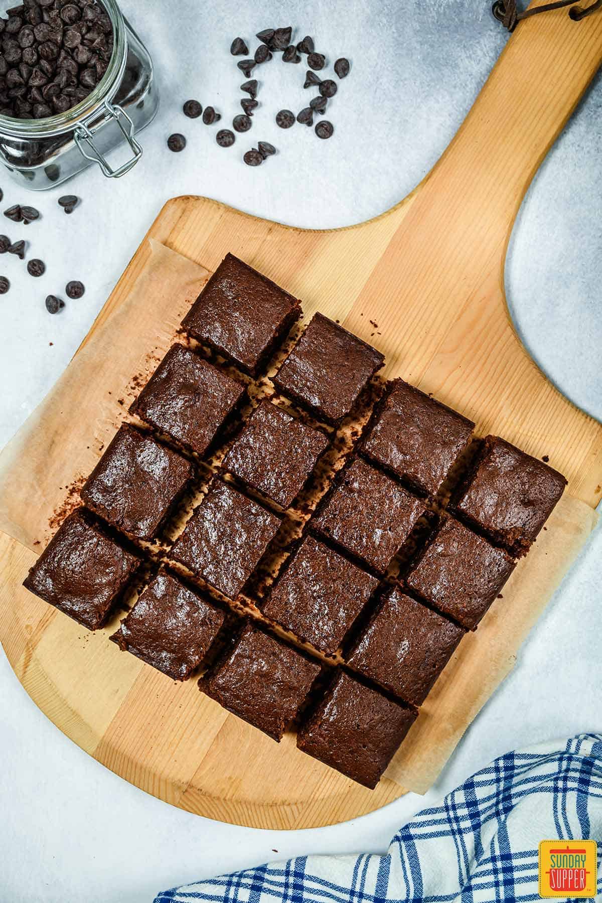 Coconut oil brownies sliced on a cutting board