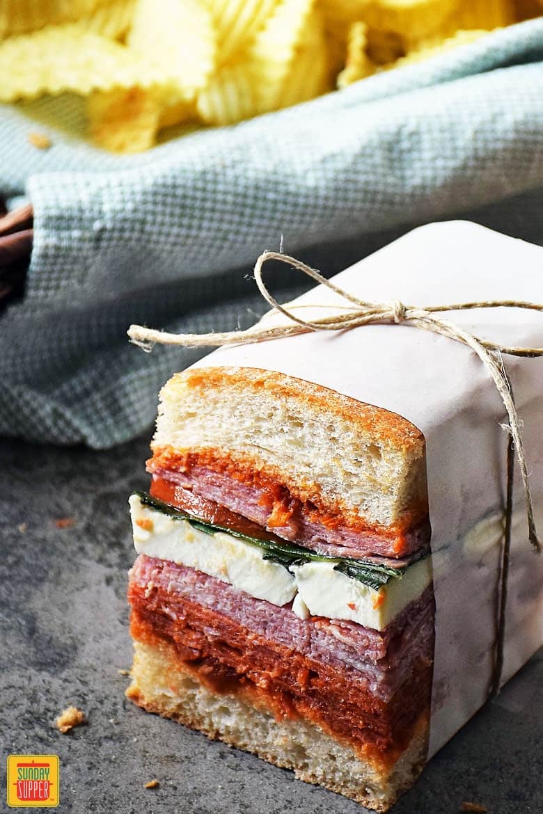 Italian Pressed Sandwiches wrapped in paper ready to eat