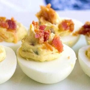 Close up of bacon jalapeno deviled eggs with cream cheese