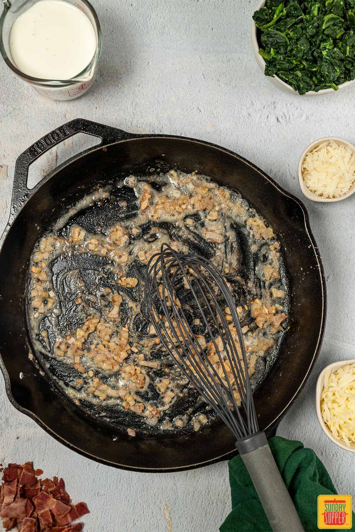 cooking shallots in pan in flour