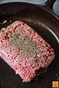 Seasoned ground beef in skillet