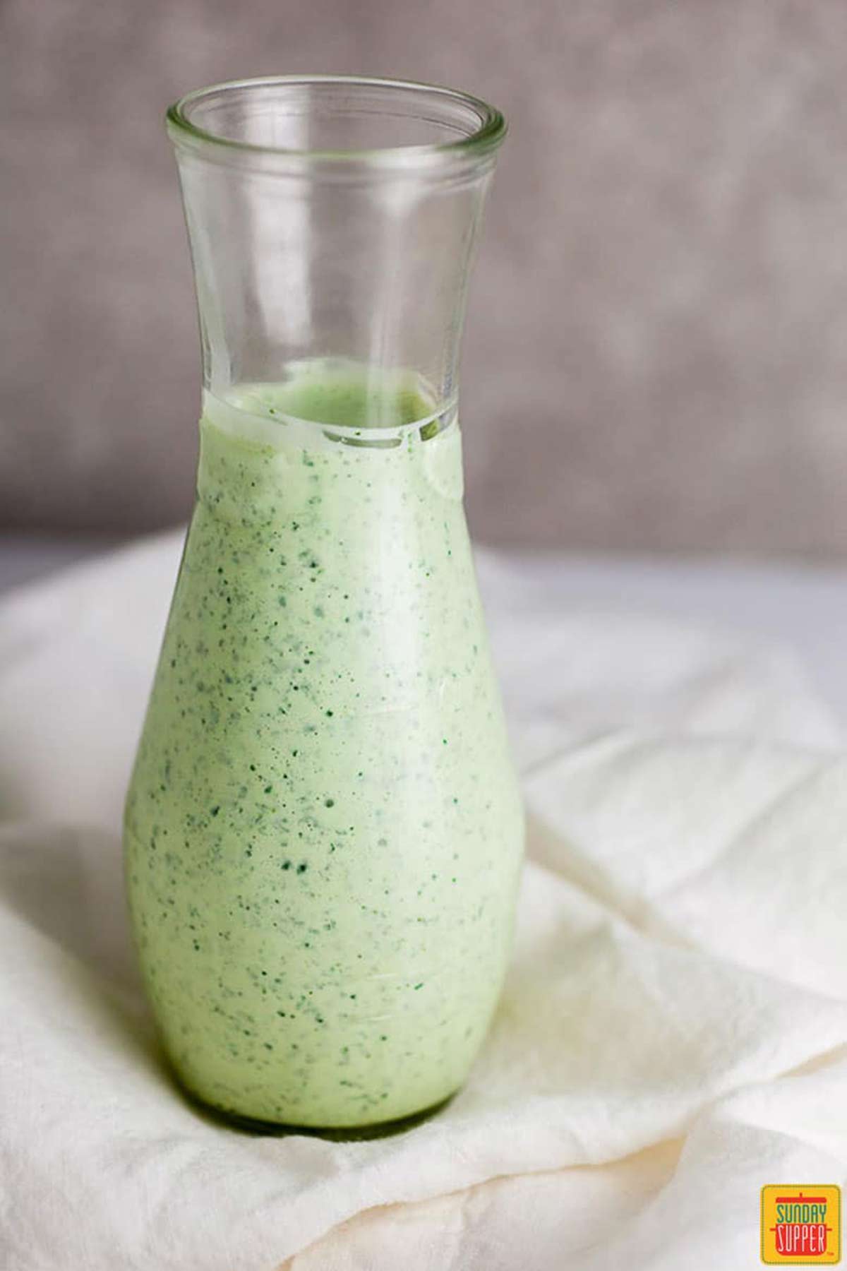 Cilantro lime dressing in a glass