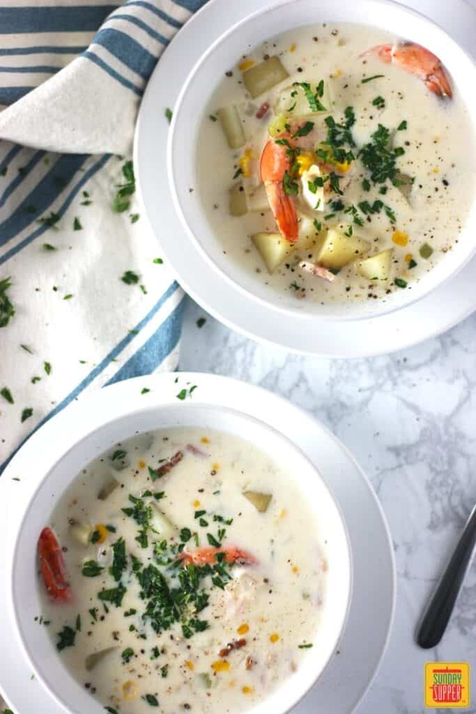 new england chowder A quick and easy seafood recipe, this New England seafood chowder is a hug in a bowl! Creamy, fresh and delicious, you'll love how easy this recipe is to make!