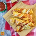 Pizza Twists on a wooden board