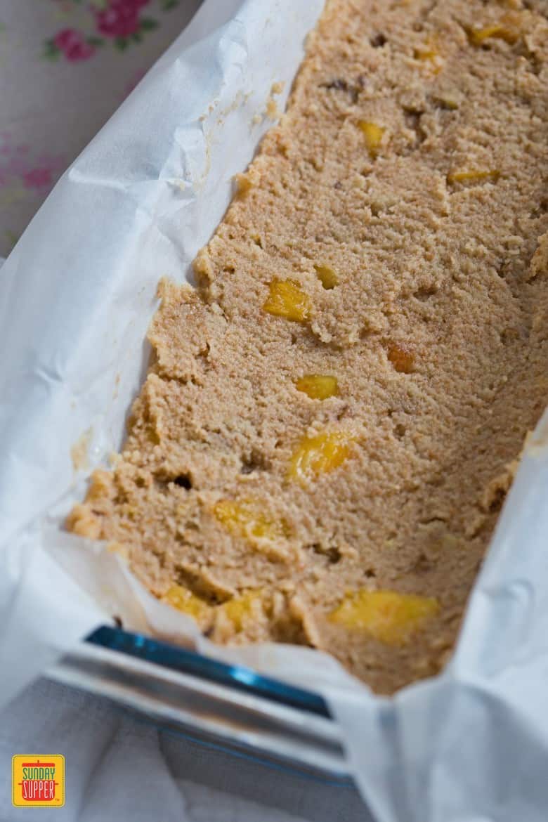 Healthy Peach Bread batter in the loaf pan just before being baked
