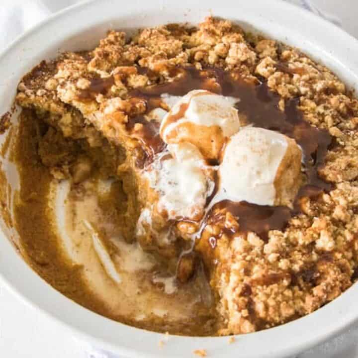 Pumpkin Cobbler with it’s sweet, creamy pumpkin custard base, topped with a crunchy, crumbly cobbler topping is makes the perfect comforting fall dessert.