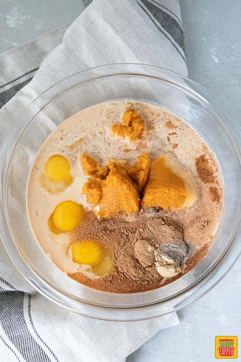 pumpkin crunch cake batter before mixing in a bowl