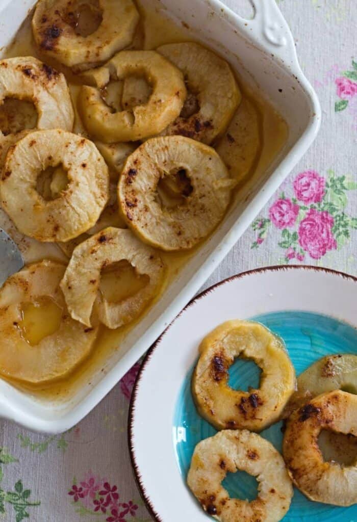 Sliced Baked Apples in a pan and on a plate