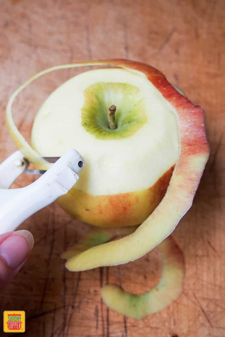 peeling an apple for stewed apples