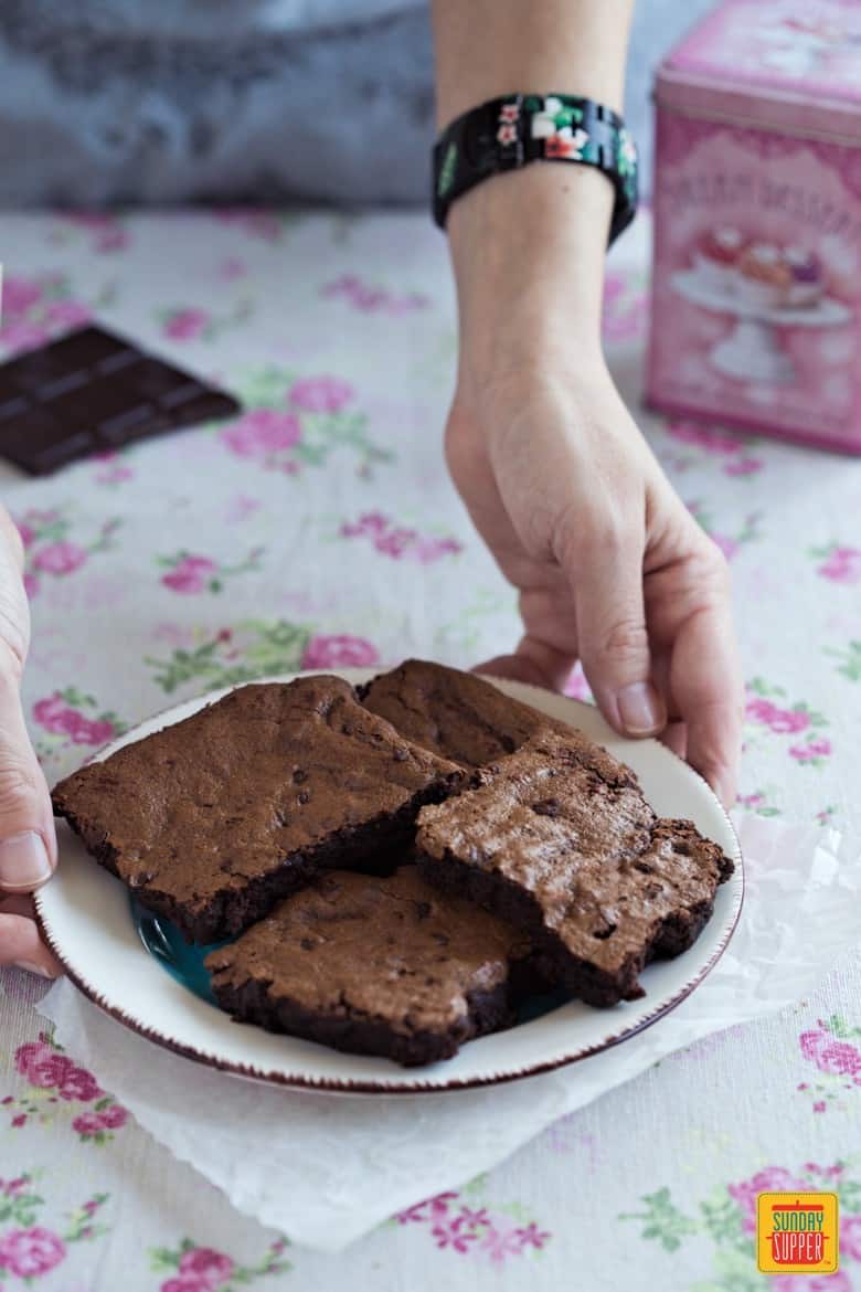 Gluten Free Fudge Brownies being served on a white plate