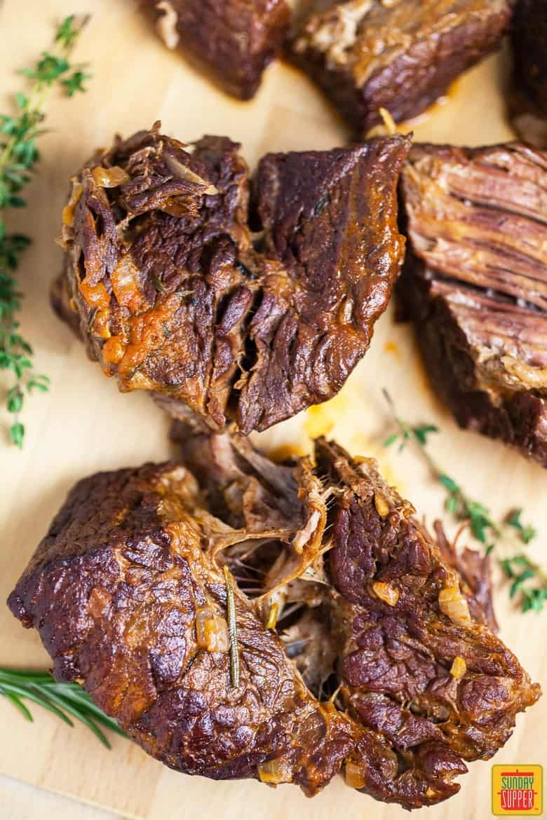 Instant pot pot roast meat on a cutting board