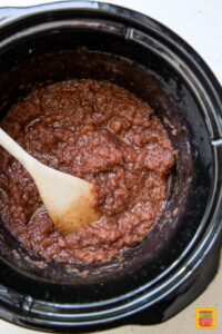 Slow cooker applesauce in the crockpot after cooking