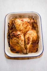 Whole chicken slightly after roasting with peri peri sauce