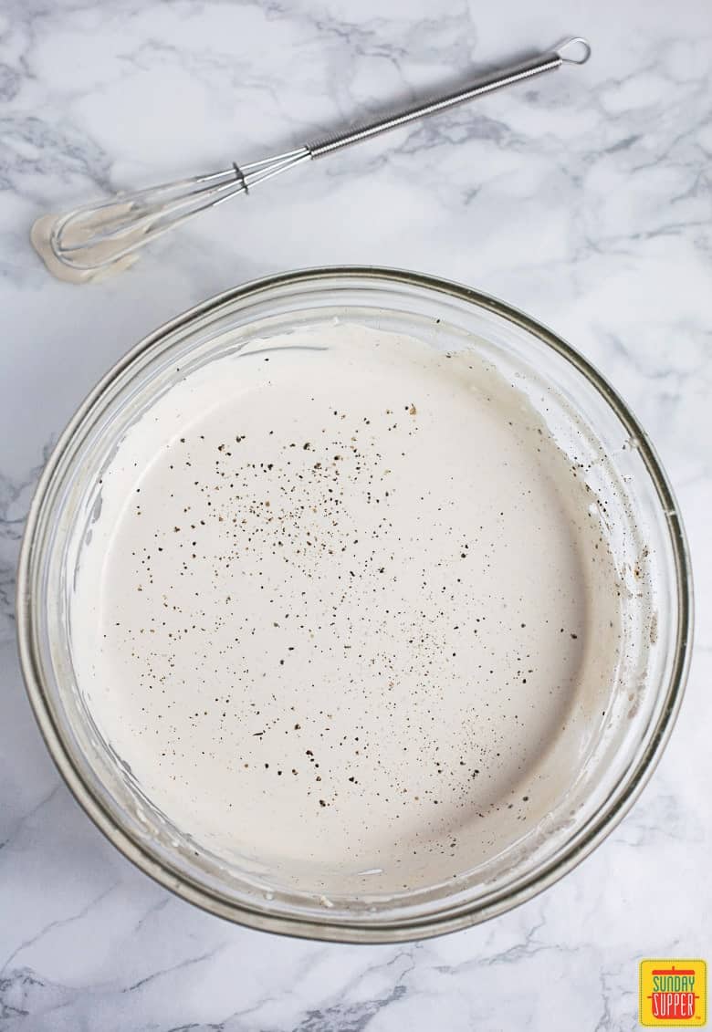 How To Make Blue Cheese Dressing: dressing base ready to be mixed with blue cheese in a bowl