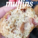 Stewed rhubarb muffins pin image - holding half a rhubarb muffin in hand