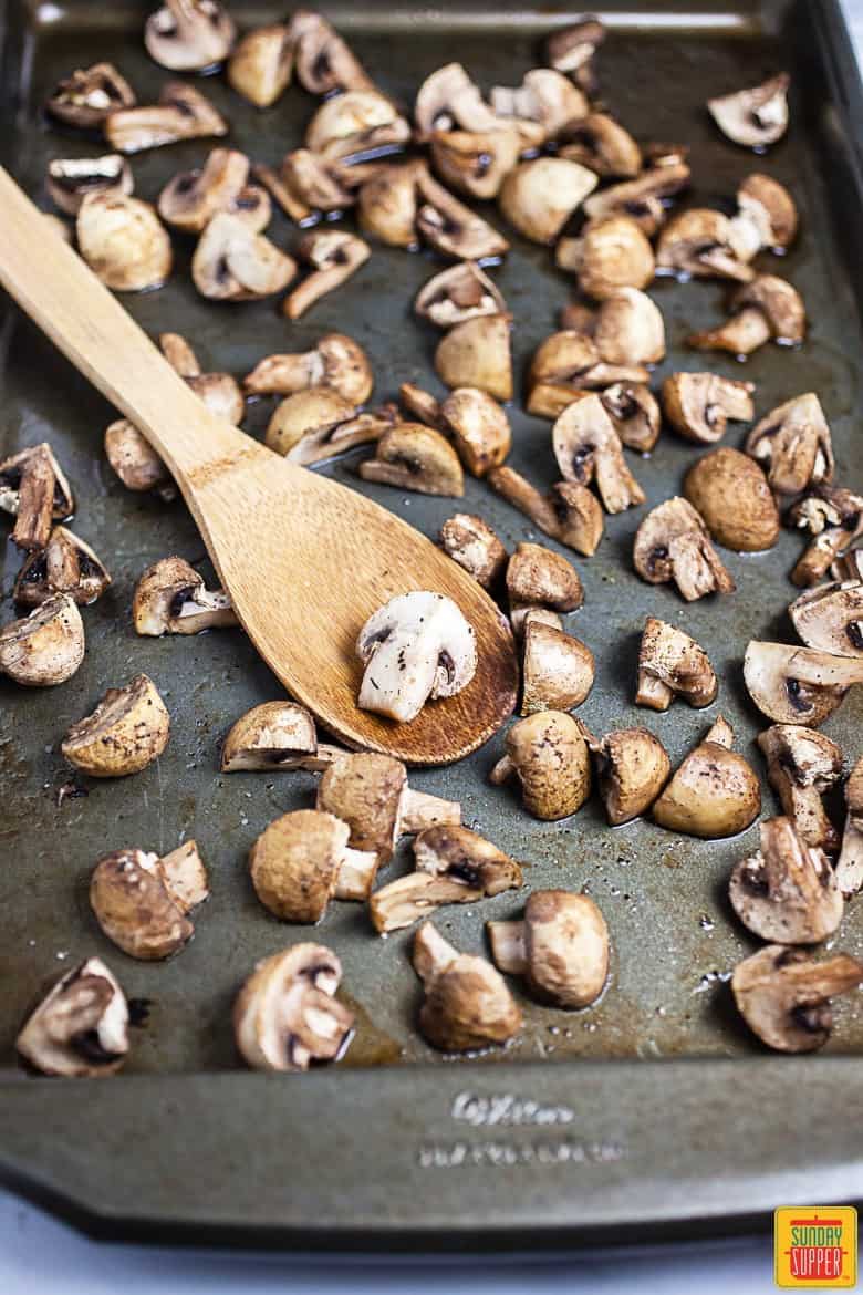 Roasting the button mushrooms for the veggie burger patties