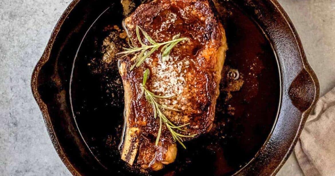 Reverse sear ribeye steak in cast iron skillet