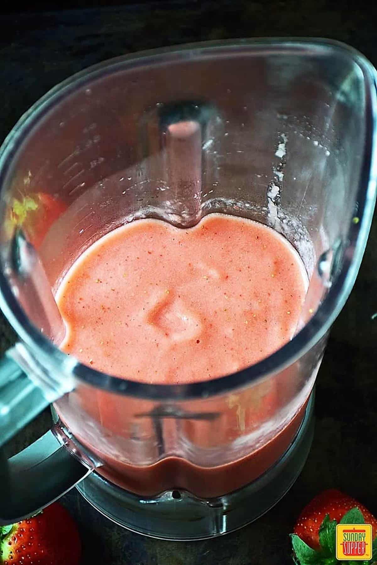 Blended strawberries and milk