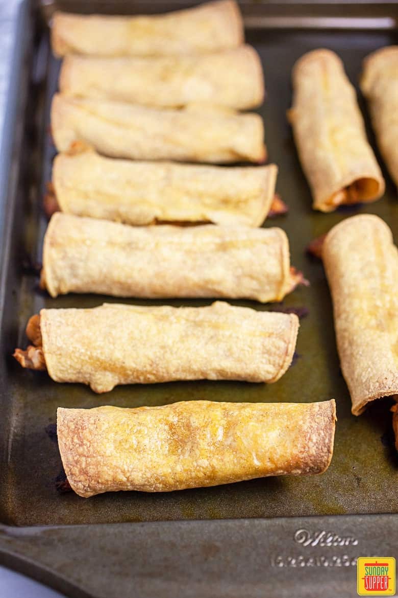 Baked Chicken Taquitos On Baking Sheet