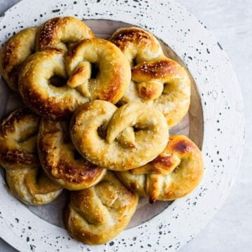Soft Pretzel Recipe: a white plate of fresh homemade soft pretzels