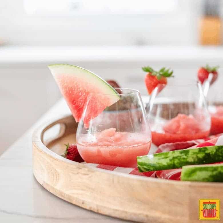 frose recipe in glasses with fresh strawberries and watermelon slices