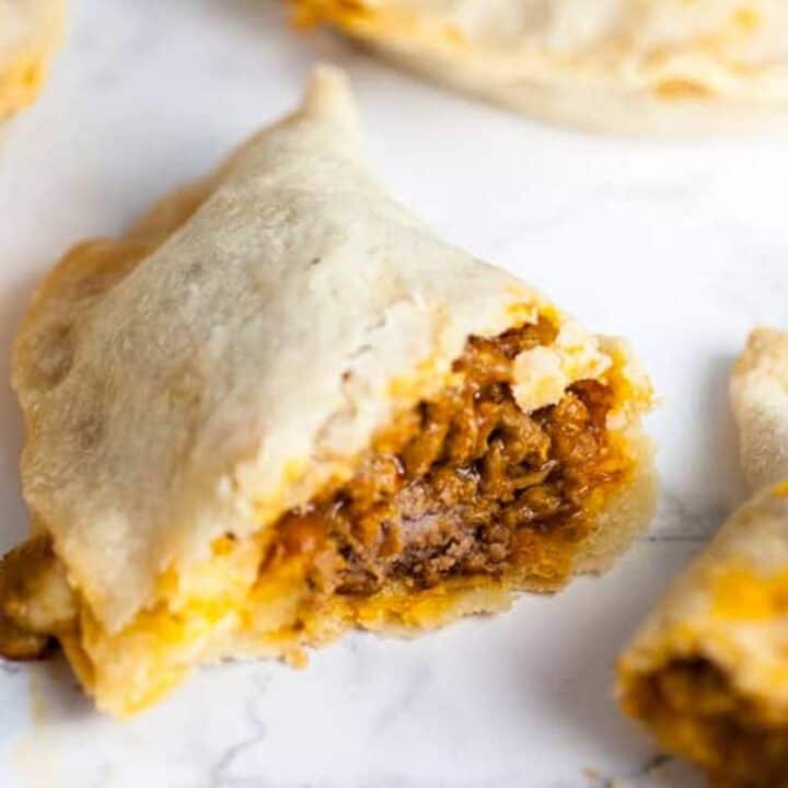 Puerto Rican Baked Empanadas open to show filling