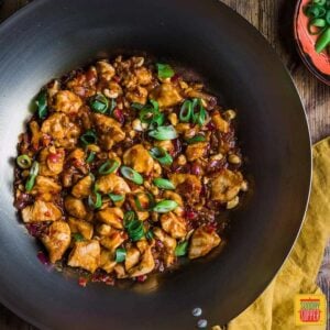 Dragon chicken recipe in a wok, an overhead shot