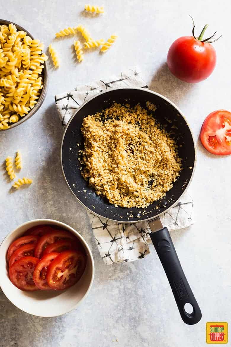 toasted bread crumbs and ingredients for Ina Garten Mac and Cheese