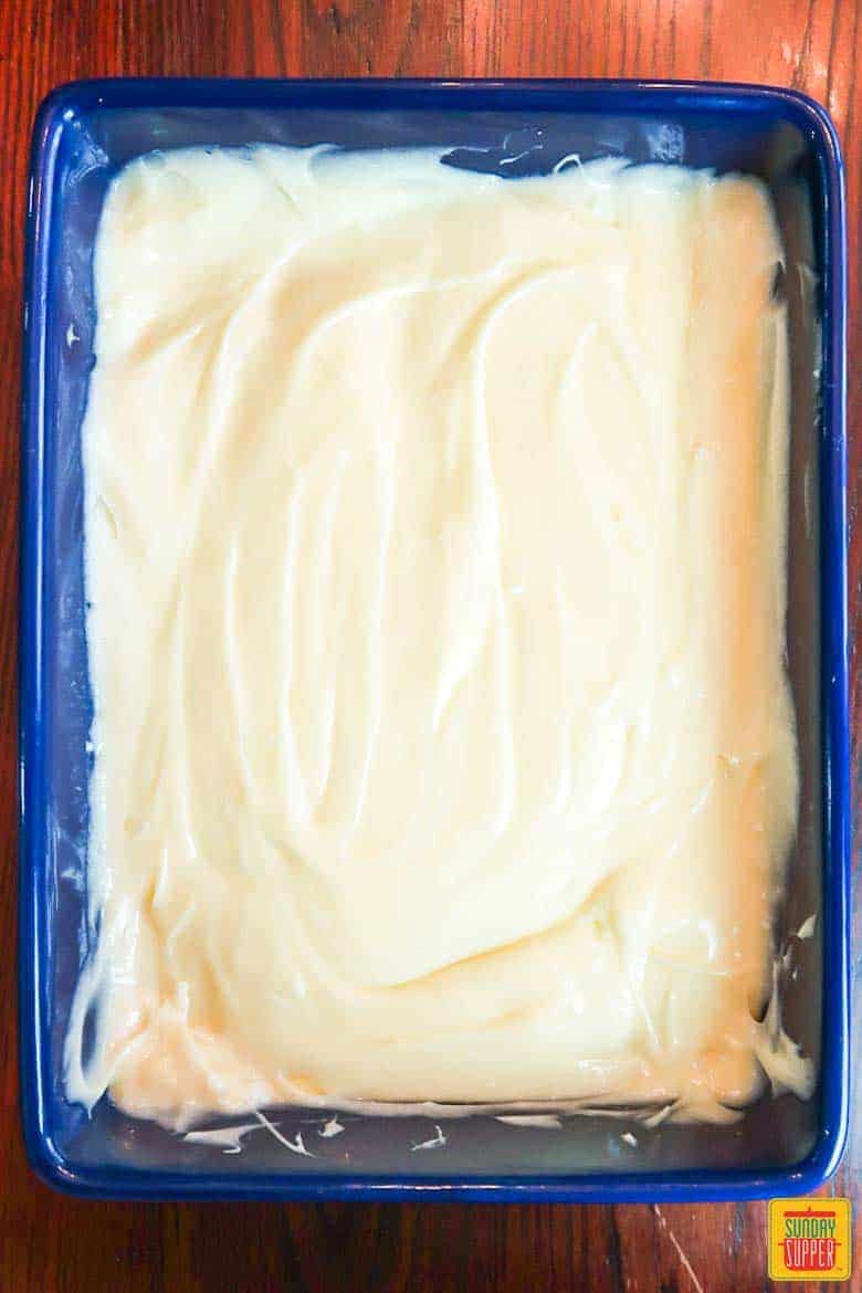 Butter cake batter in baking dish ready to be baked