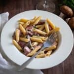 Creamy Penne Pasta with Sliced Prime Rib - restaurant style meal served on a plate