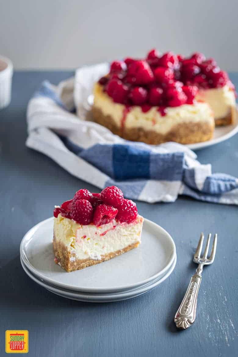Instant Pot Cheesecake sliced and served on a plate