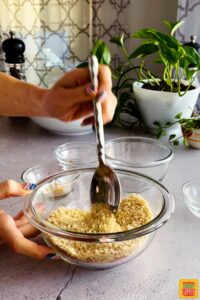 Mixing breadcrumbs seasoning mixture in a bowl