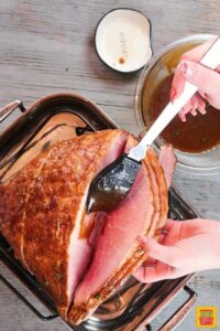 Brushing the inside of ham for honey glazed ham