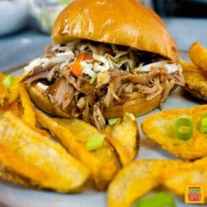 Pulled pork sandwich with potato wedges