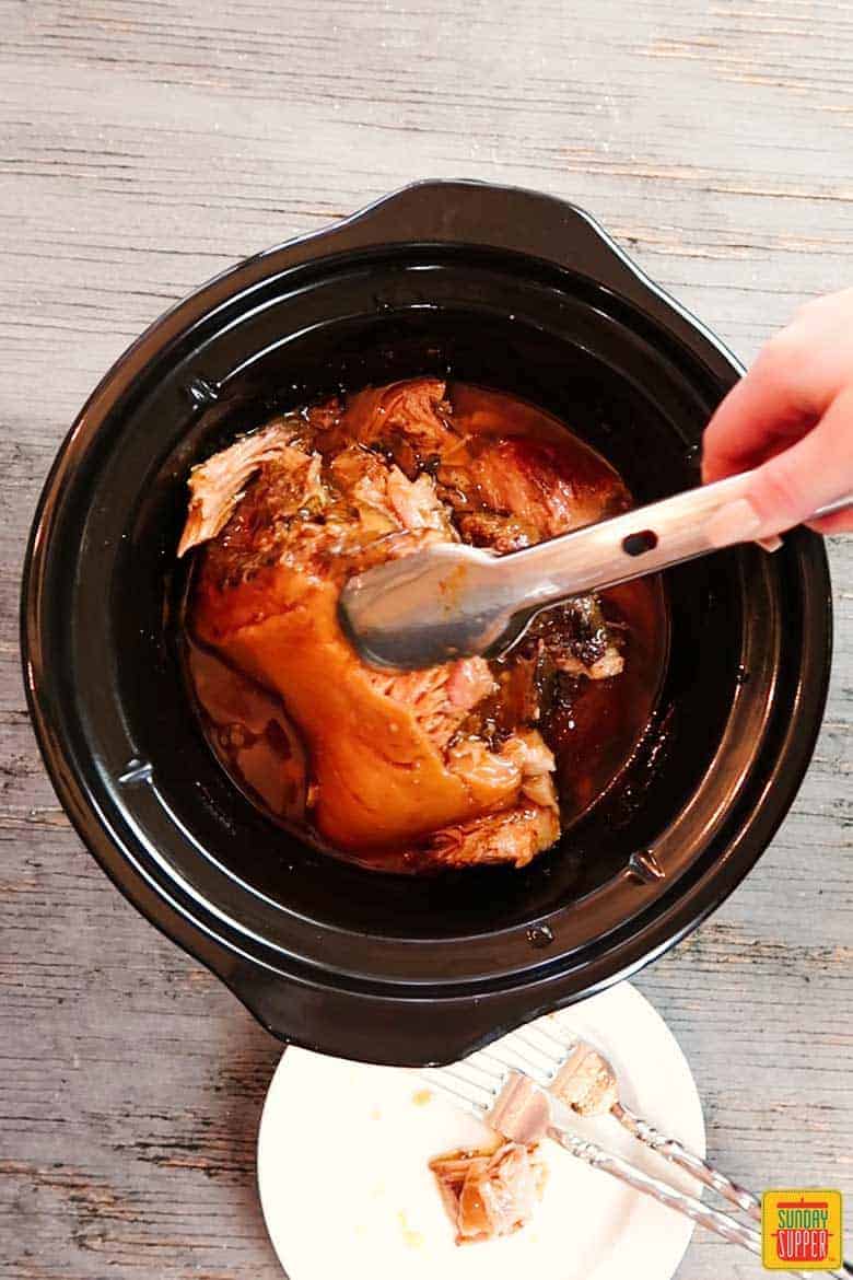 Removing fat from slow cooker pulled pork after cooking and shredding