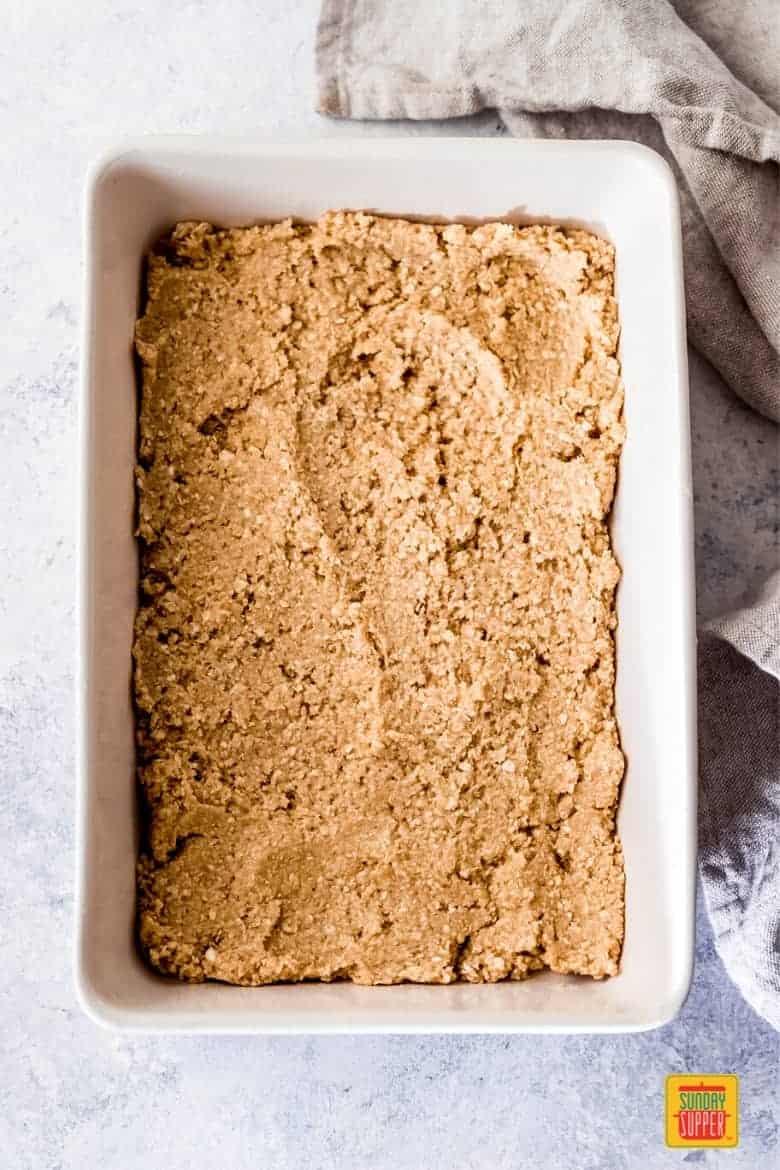 oatmeal cookie mix in a 9x13 white baking dish