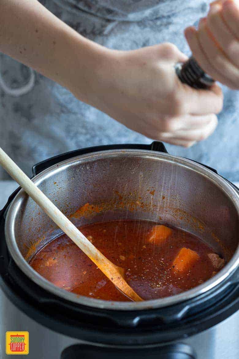 Seasoning the beef stew in the instant pot