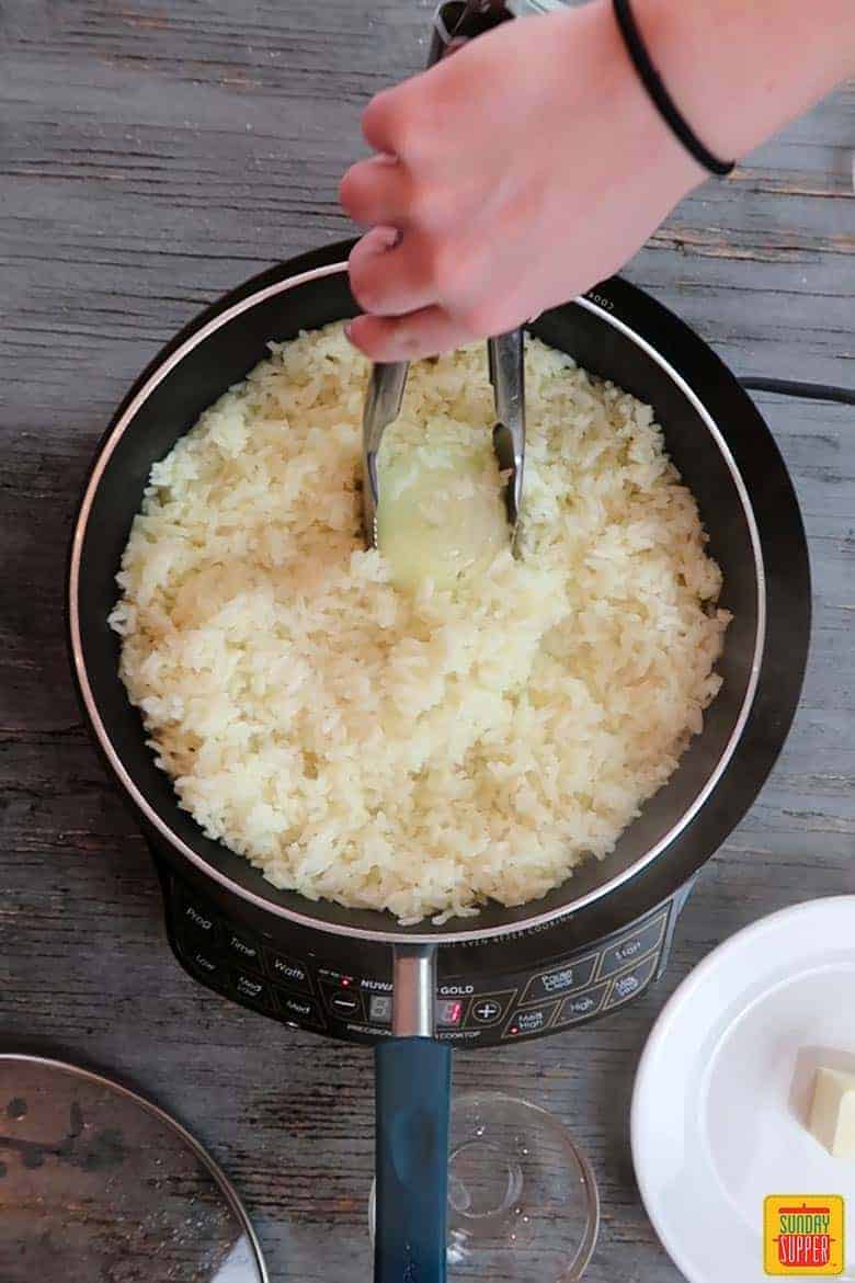 Removing the onion from the rice
