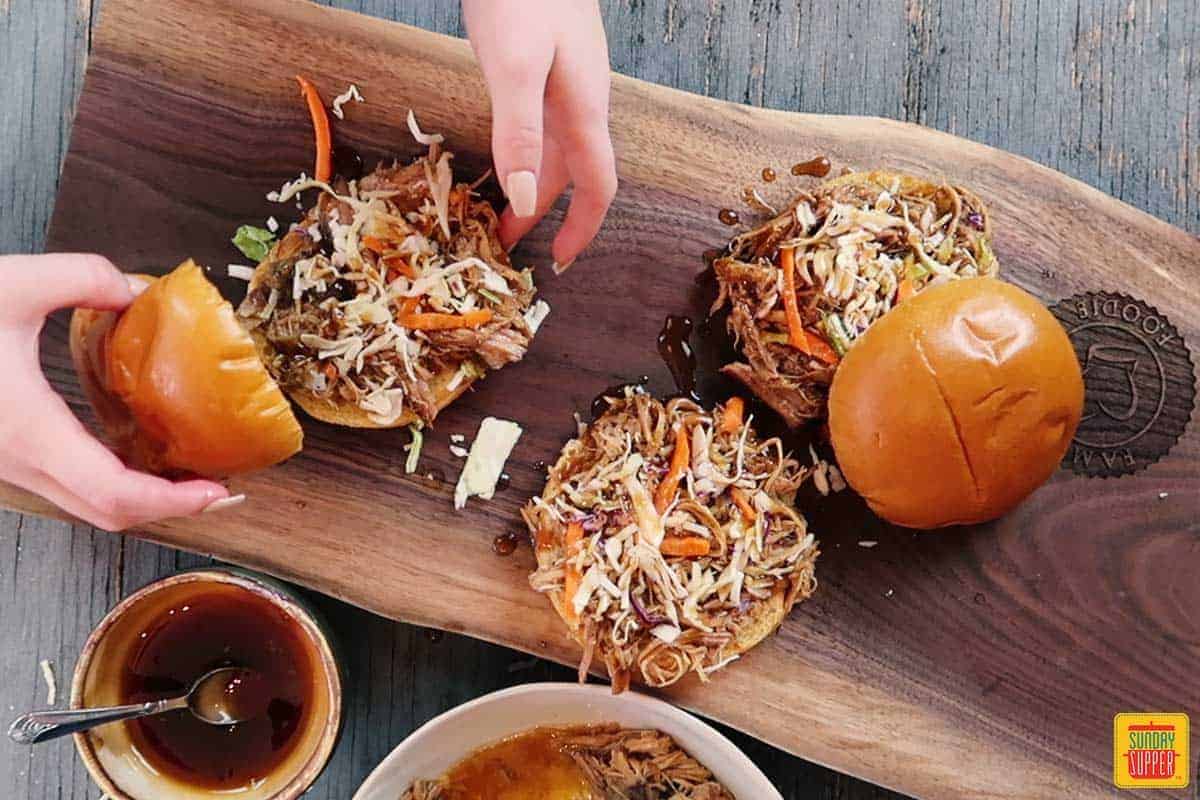 Adding the top bun back to the pulled pork sandwich recipe