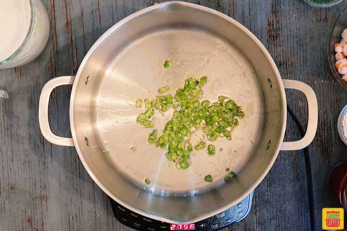 Sauteing celery and garlic for shrimp bisque recipe