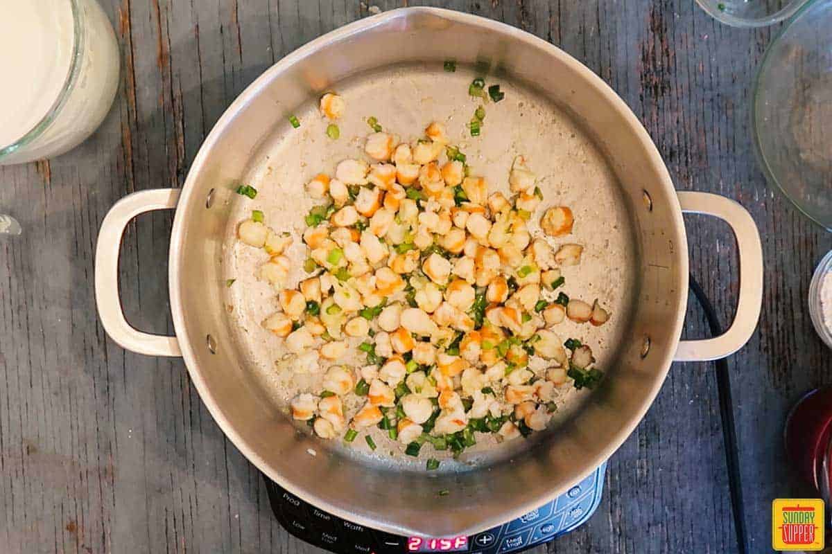 After cooking shrimp and adding green onions to pot for shrimp bisque recipe