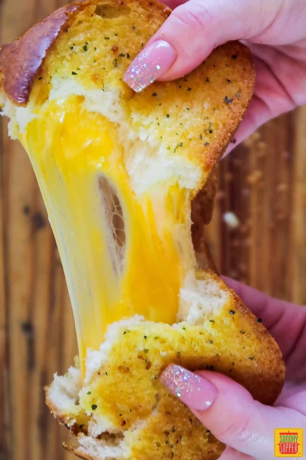 Ooey gooey grilled cheese sandwich pull apart shot