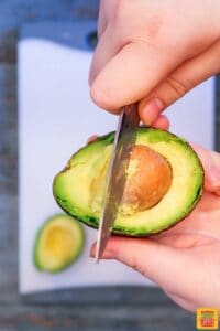 How to remove the pit from an avocado - turning the knife