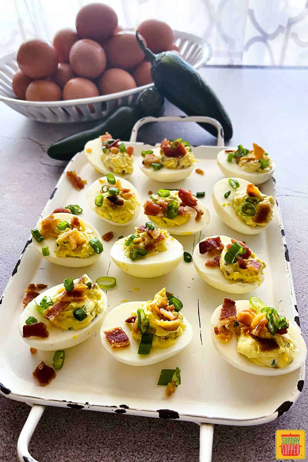 Jalapeno deviled eggs on a tray ready to eat