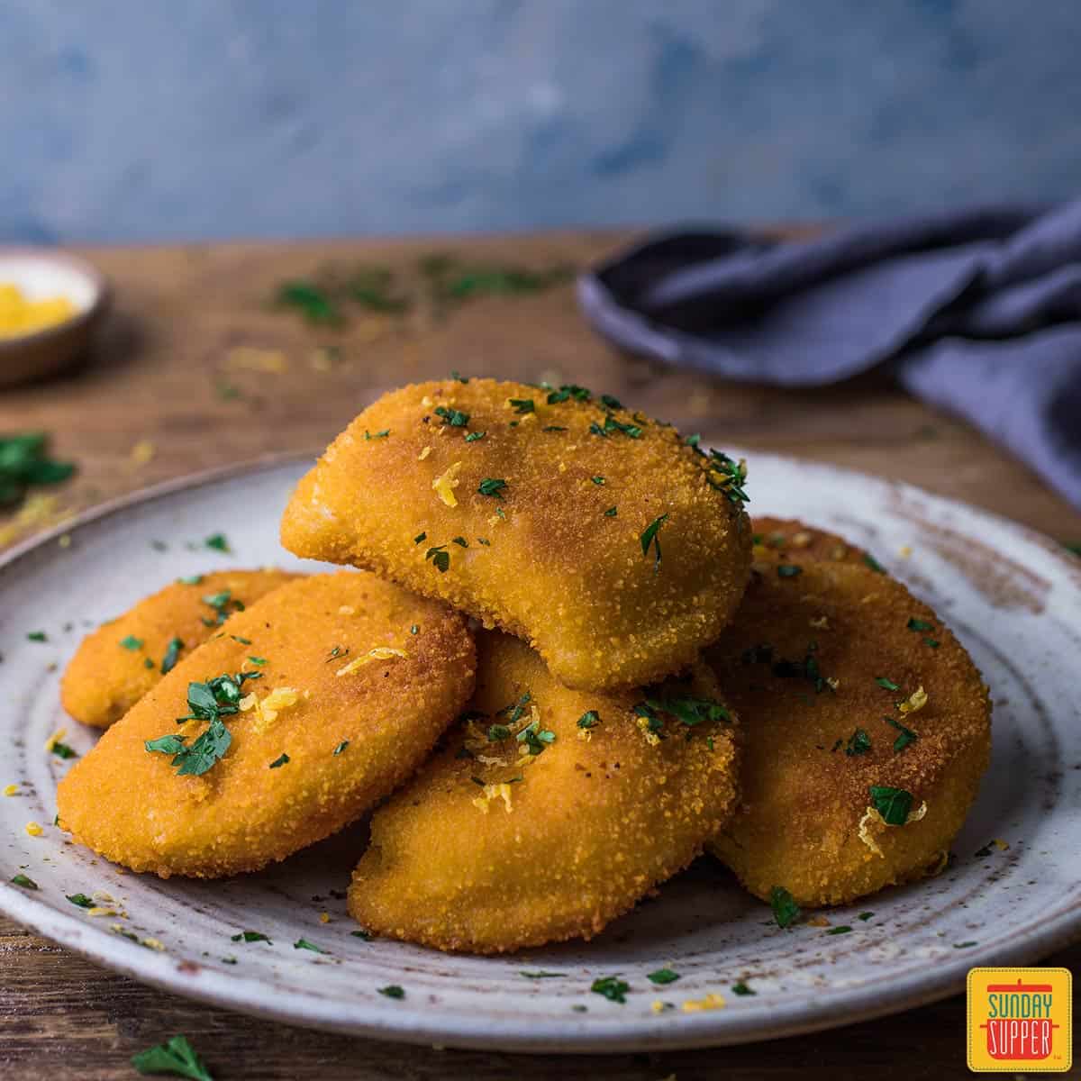 Portuguese Shrimp Empanadas ready to enjoy after frying, on a plate