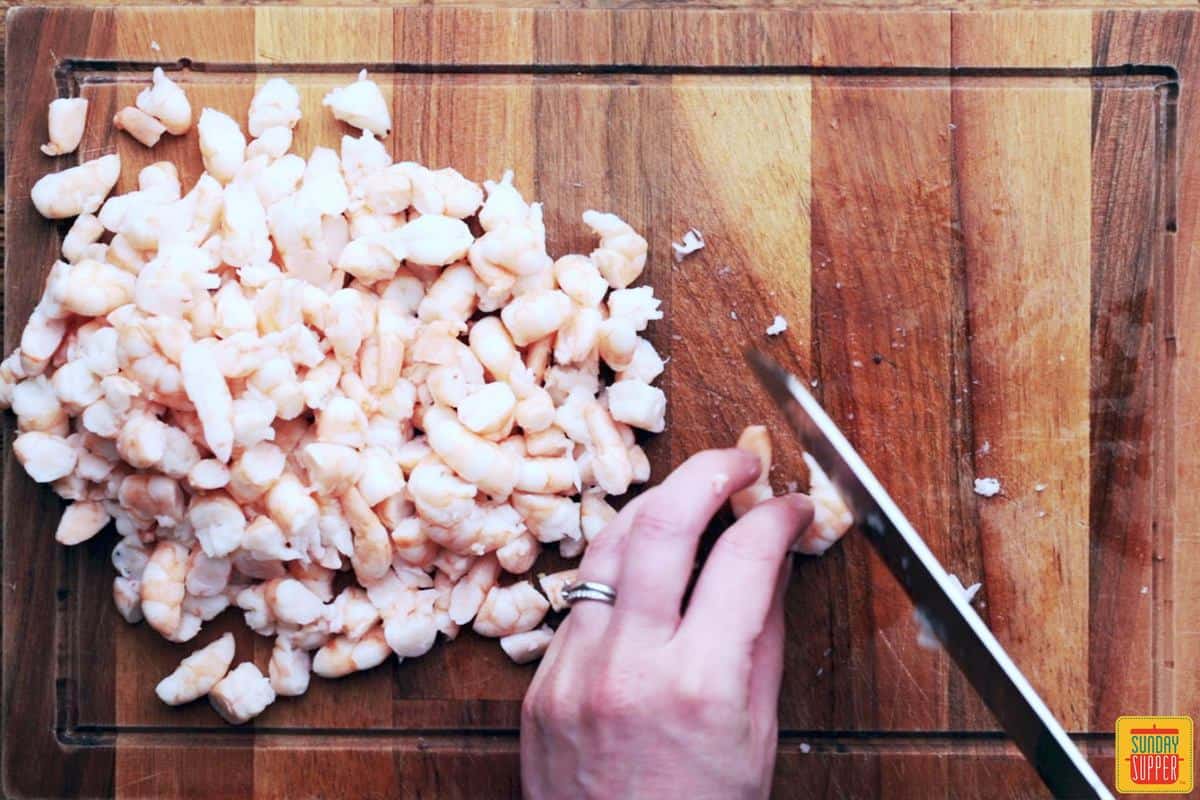Cutting shrimp for Portuguese shrimp empanadas