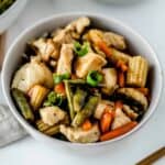 Close up of easy chicken stir fry in a white bowl